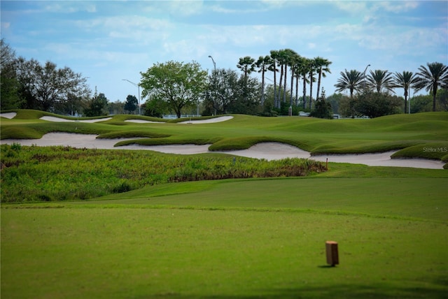 6919 Dominion Ln, Lakewood Ranch, FL 34202 - view of community featuring view of golf course and a lawn