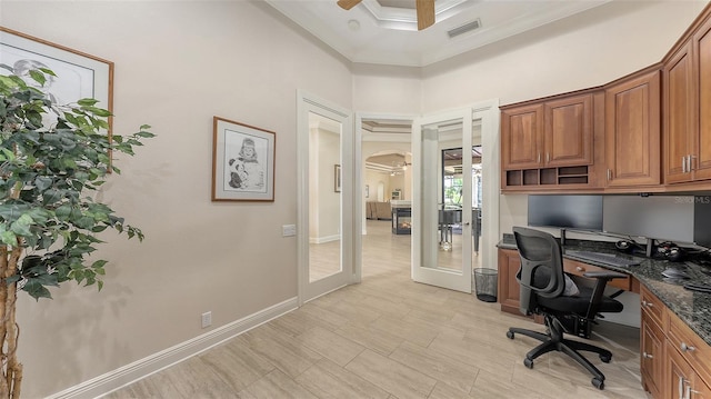 6919 Dominion Ln, Lakewood Ranch, FL 34202 - office area with a ceiling fan, arched walkways, ornamental molding, a towering ceiling, and built in study area