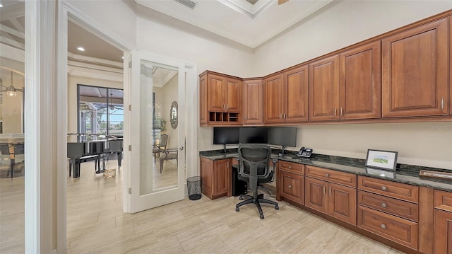 6919 Dominion Ln, Lakewood Ranch, FL 34202 - office featuring built in desk, crown molding, and light wood finished floors