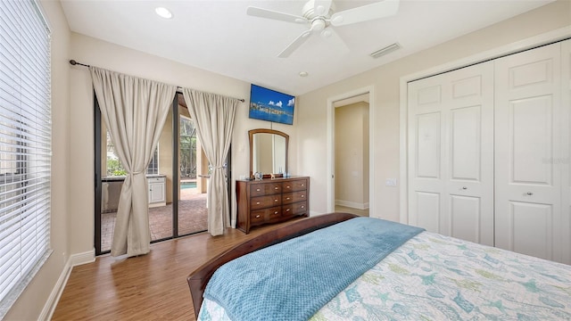 6919 Dominion Ln, Lakewood Ranch, FL 34202 - bedroom featuring wood finished floors, a closet, ceiling fan, and recessed lighting