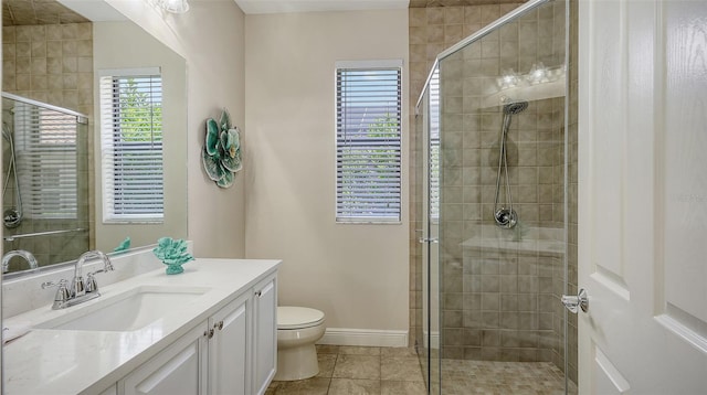 6919 Dominion Ln, Lakewood Ranch, FL 34202 - full bath featuring vanity, a stall shower, and tile patterned flooring