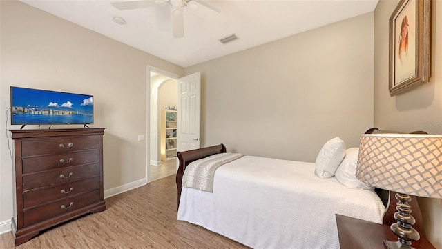 6919 Dominion Ln, Lakewood Ranch, FL 34202 - bedroom featuring light wood-style floors and ceiling fan