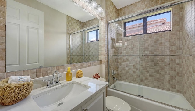 6919 Dominion Ln, Lakewood Ranch, FL 34202 - full bath with vanity and shower / bath combination with glass door