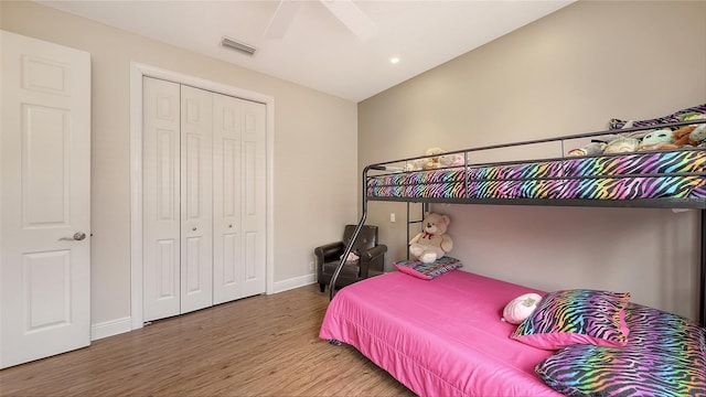 6919 Dominion Ln, Lakewood Ranch, FL 34202 - bedroom featuring wood finished floors, a closet, ceiling fan, and recessed lighting