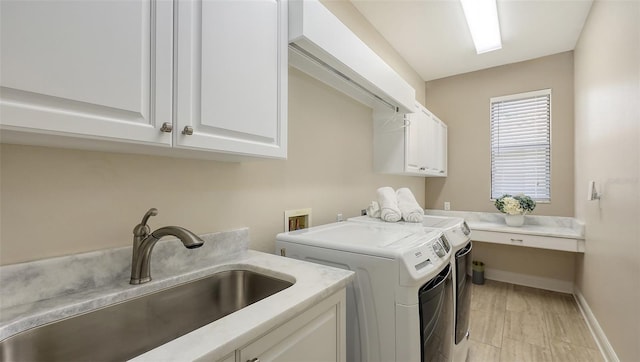 6919 Dominion Ln, Lakewood Ranch, FL 34202 - laundry room featuring washing machine and clothes dryer and cabinet space