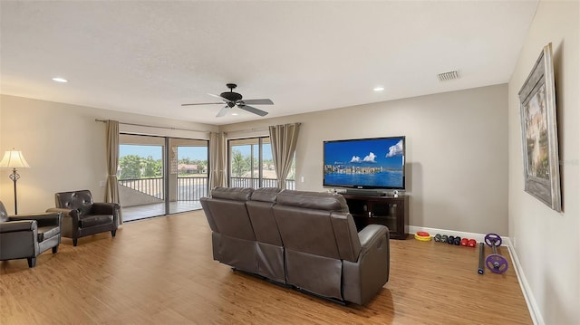 6919 Dominion Ln, Lakewood Ranch, FL 34202 - living room with a ceiling fan, light wood-style flooring, and recessed lighting
