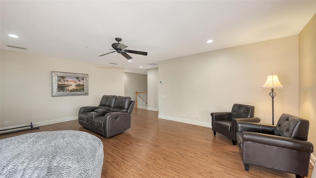 6919 Dominion Ln, Lakewood Ranch, FL 34202 - bedroom with wood finished floors, a ceiling fan, and recessed lighting