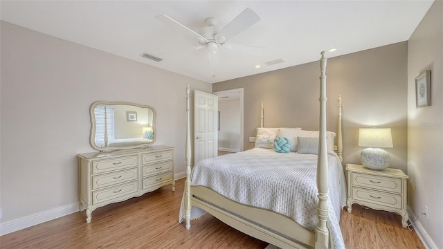 6919 Dominion Ln, Lakewood Ranch, FL 34202 - bedroom featuring wood finished floors, a ceiling fan, and recessed lighting