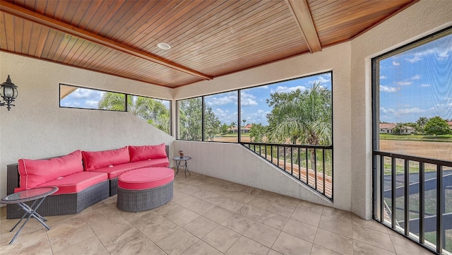 6919 Dominion Ln, Lakewood Ranch, FL 34202 - sunroom / solarium with an outdoor living space and beamed ceiling
