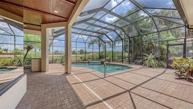 6919 Dominion Ln, Lakewood Ranch, FL 34202 - view of pool featuring a pool with connected hot tub, a patio area, and a lanai