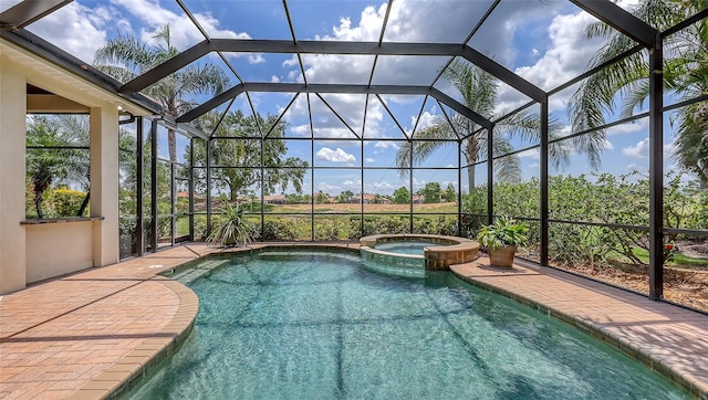 6919 Dominion Ln, Lakewood Ranch, FL 34202 - view of pool featuring a pool with connected hot tub, a lanai, and a patio
