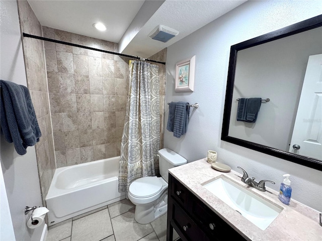 full bathroom with vanity, tile patterned flooring, shower / bath combo with shower curtain, and toilet