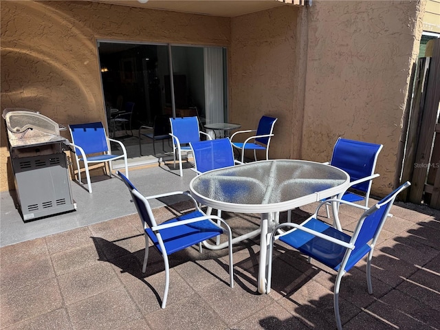 view of patio with outdoor dining space