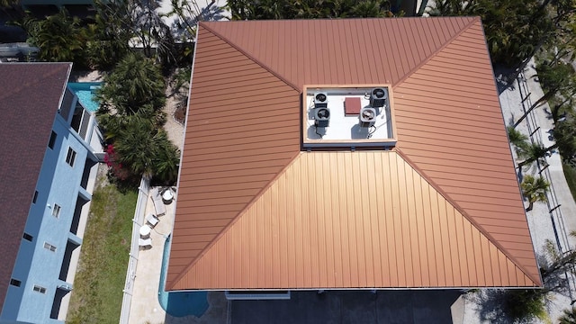 view of home's exterior with metal roof