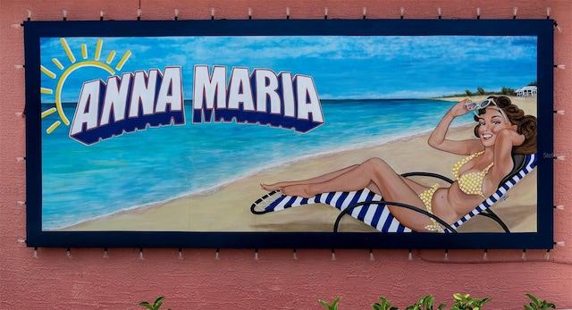 community sign with a view of the beach