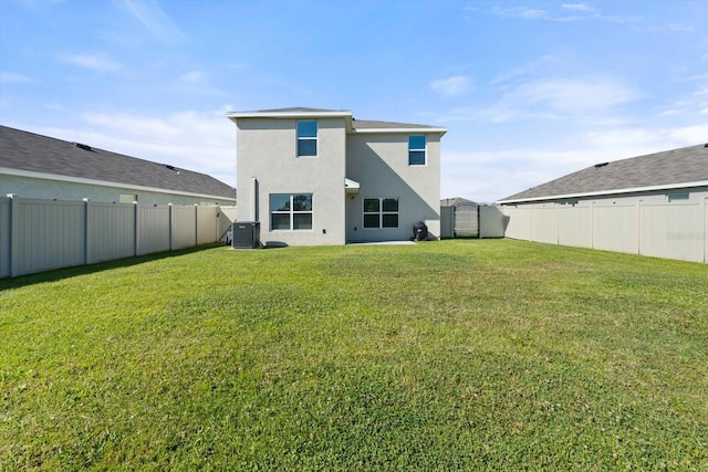 6314 Distant Haze Pl, Palmetto, FL 34221 - back of property with stucco siding and central AC