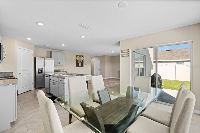 6314 Distant Haze Pl, Palmetto, FL 34221 - dining area with recessed lighting, light tile patterned floors, and baseboards