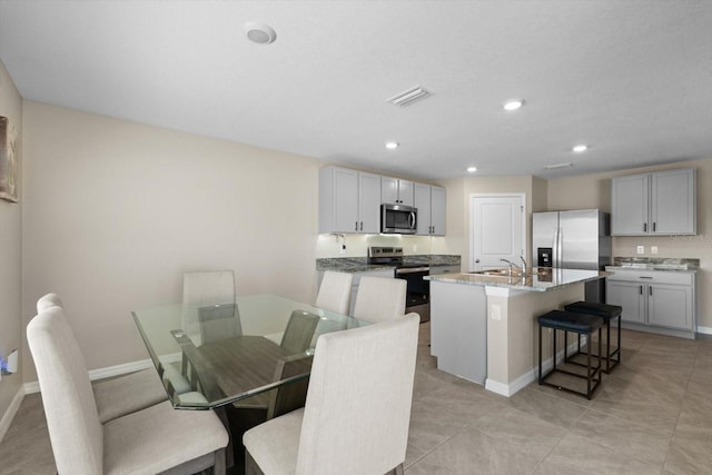 6314 Distant Haze Pl, Palmetto, FL 34221 - dining space featuring baseboards and recessed lighting