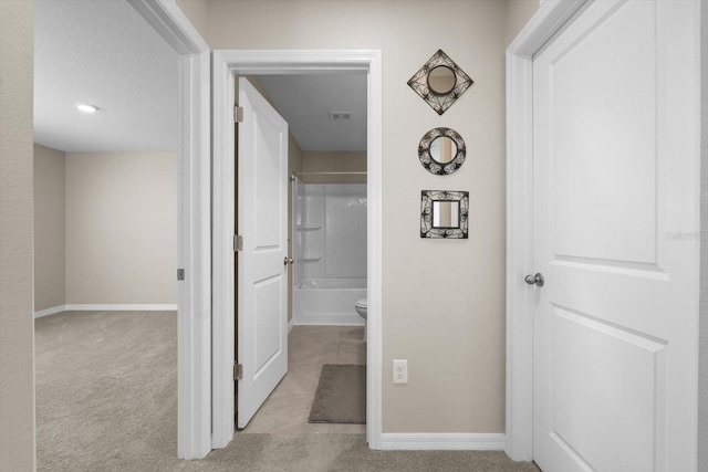 6314 Distant Haze Pl, Palmetto, FL 34221 - hallway featuring baseboards and carpet
