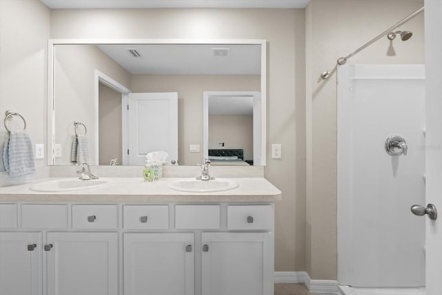 6314 Distant Haze Pl, Palmetto, FL 34221 - bathroom with double vanity, a shower, and connected bathroom