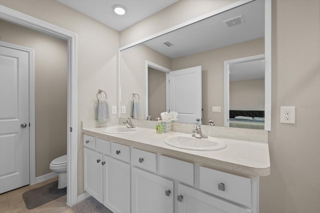 6314 Distant Haze Pl, Palmetto, FL 34221 - ensuite bathroom featuring double vanity, toilet, and tile patterned flooring