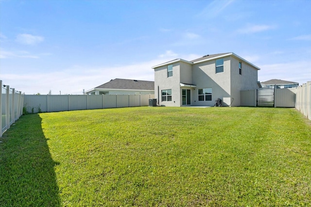 6314 Distant Haze Pl, Palmetto, FL 34221 - back of house with stucco siding, a gate, and cooling unit