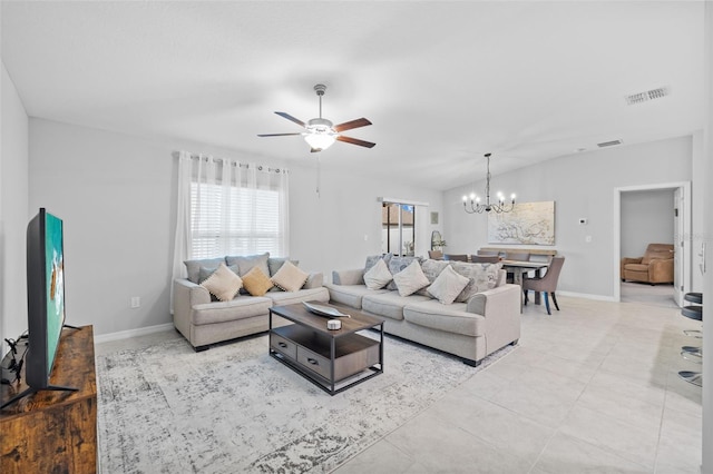 living room with baseboards, ceiling fan with notable chandelier, and visible vents