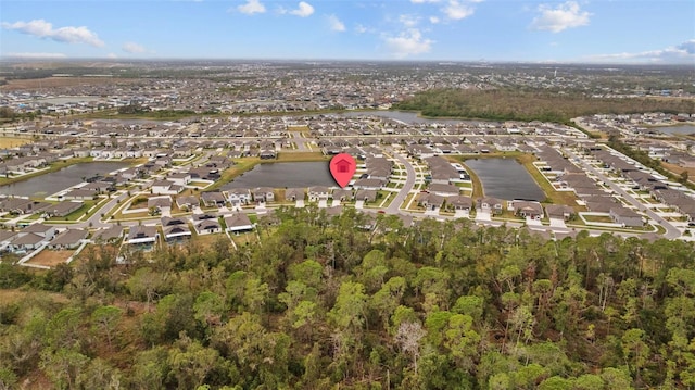 aerial view with a water view and a residential view