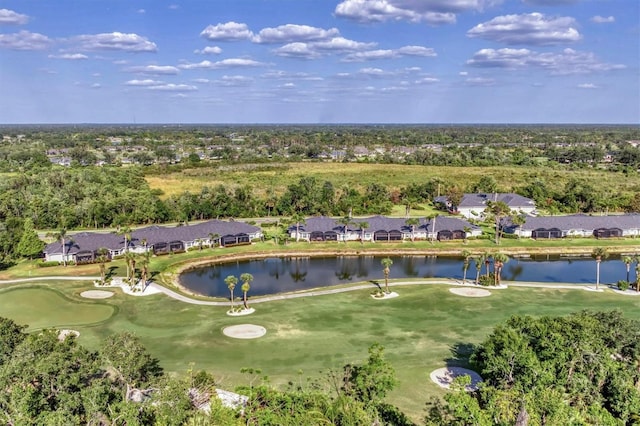 aerial view with a water view, view of golf course, and a residential view