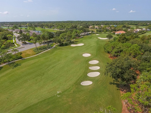 birds eye view of property with golf course view