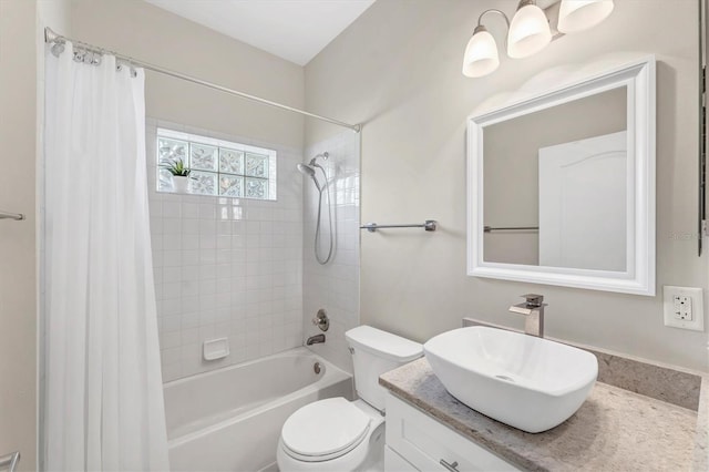 bathroom with vanity, toilet, and shower / tub combo with curtain