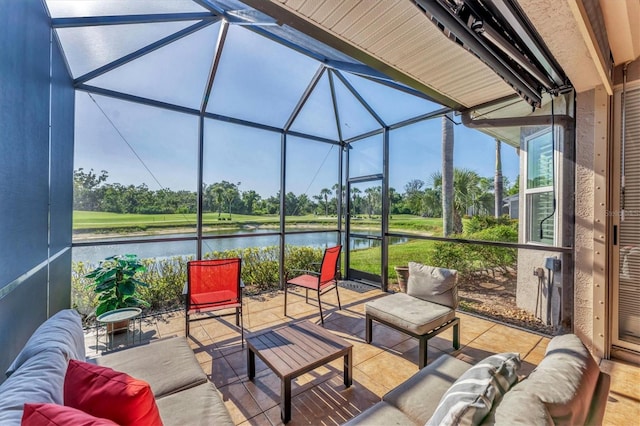 view of patio / terrace featuring a lanai, a water view, an outdoor living space, and view of golf course
