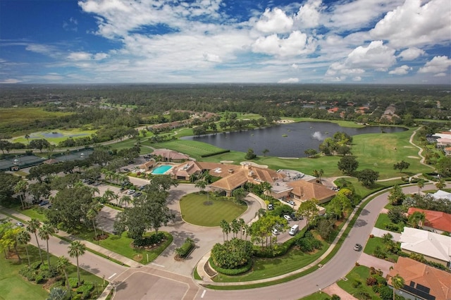 bird's eye view with a residential view, view of golf course, and a water view