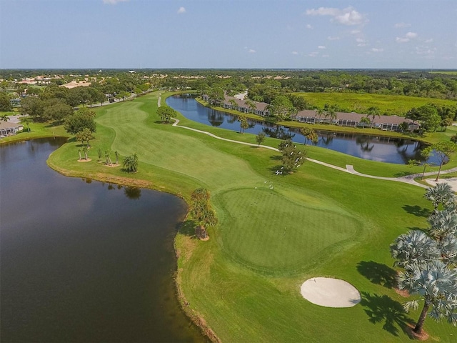 drone / aerial view featuring a water view and view of golf course