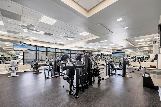 5217 Chase Oaks Dr, Sarasota, FL 34241 - gym with ceiling fan, a drop ceiling, and a tray ceiling