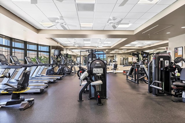 5217 Chase Oaks Dr, Sarasota, FL 34241 - exercise room featuring ceiling fan and a paneled ceiling