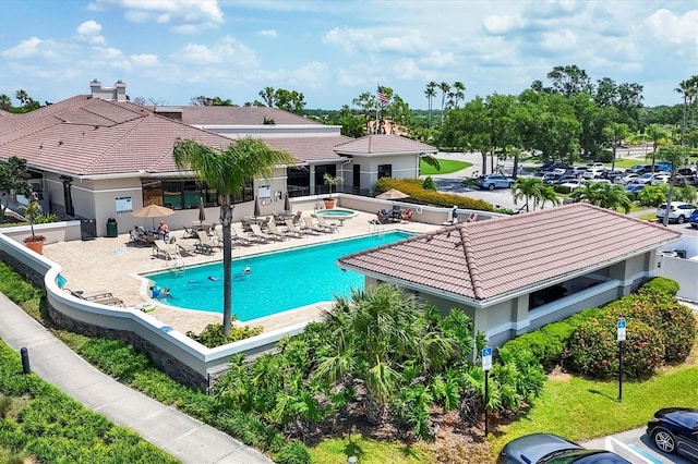 5217 Chase Oaks Dr, Sarasota, FL 34241 - community pool with a patio