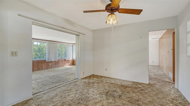 2702 Bedford Way, Sarasota, FL 34239 - carpeted spare room with ceiling fan and visible vents