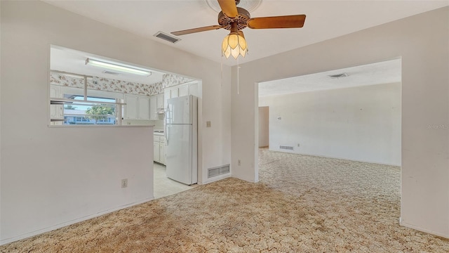 2702 Bedford Way, Sarasota, FL 34239 - unfurnished room featuring visible vents and light carpet