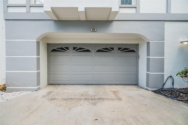 garage with driveway