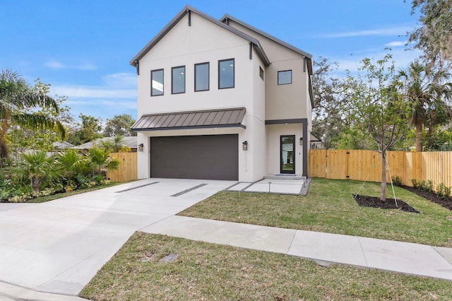 2554 Arlington St, Sarasota, FL 34239 - view of front of property with a standing seam roof, an attached garage, fence, and stucco siding