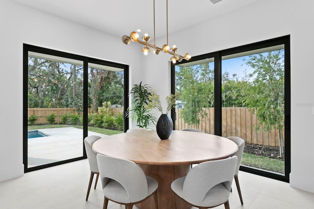 2554 Arlington St, Sarasota, FL 34239 - dining area featuring a chandelier