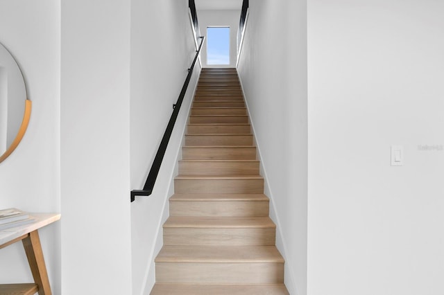 2554 Arlington St, Sarasota, FL 34239 - stairs featuring a high ceiling