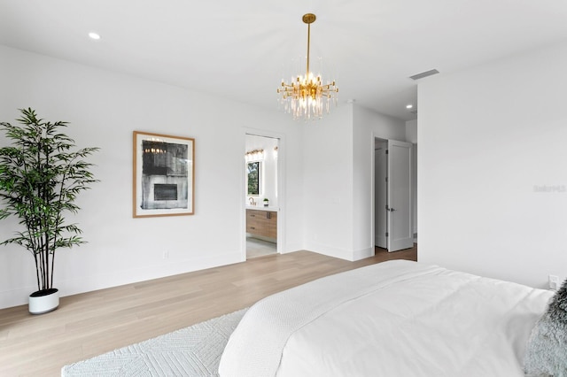 2554 Arlington St, Sarasota, FL 34239 - bedroom featuring visible vents, recessed lighting, wood finished floors, and a chandelier