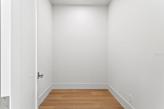 2554 Arlington St, Sarasota, FL 34239 - empty room with baseboards and light wood finished floors