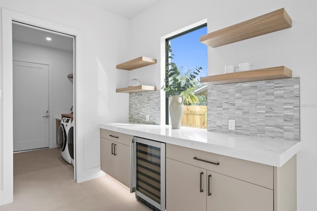 2554 Arlington St, Sarasota, FL 34239 - bar featuring beverage cooler, separate washer and dryer, recessed lighting, decorative backsplash, and indoor bar
