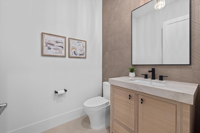 1559 Bay Rd, Sarasota, FL 34239 - half bath with toilet, baseboards, tile patterned flooring, and vanity