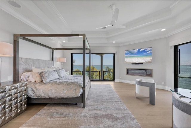 bedroom with a ceiling fan, recessed lighting, ornamental molding, visible vents, and wood finished floors