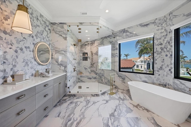 bathroom featuring a marble finish shower, a freestanding tub, marble finish floor, vanity, and recessed lighting