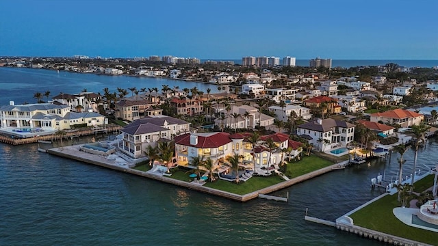 bird's eye view with a water view and a residential view